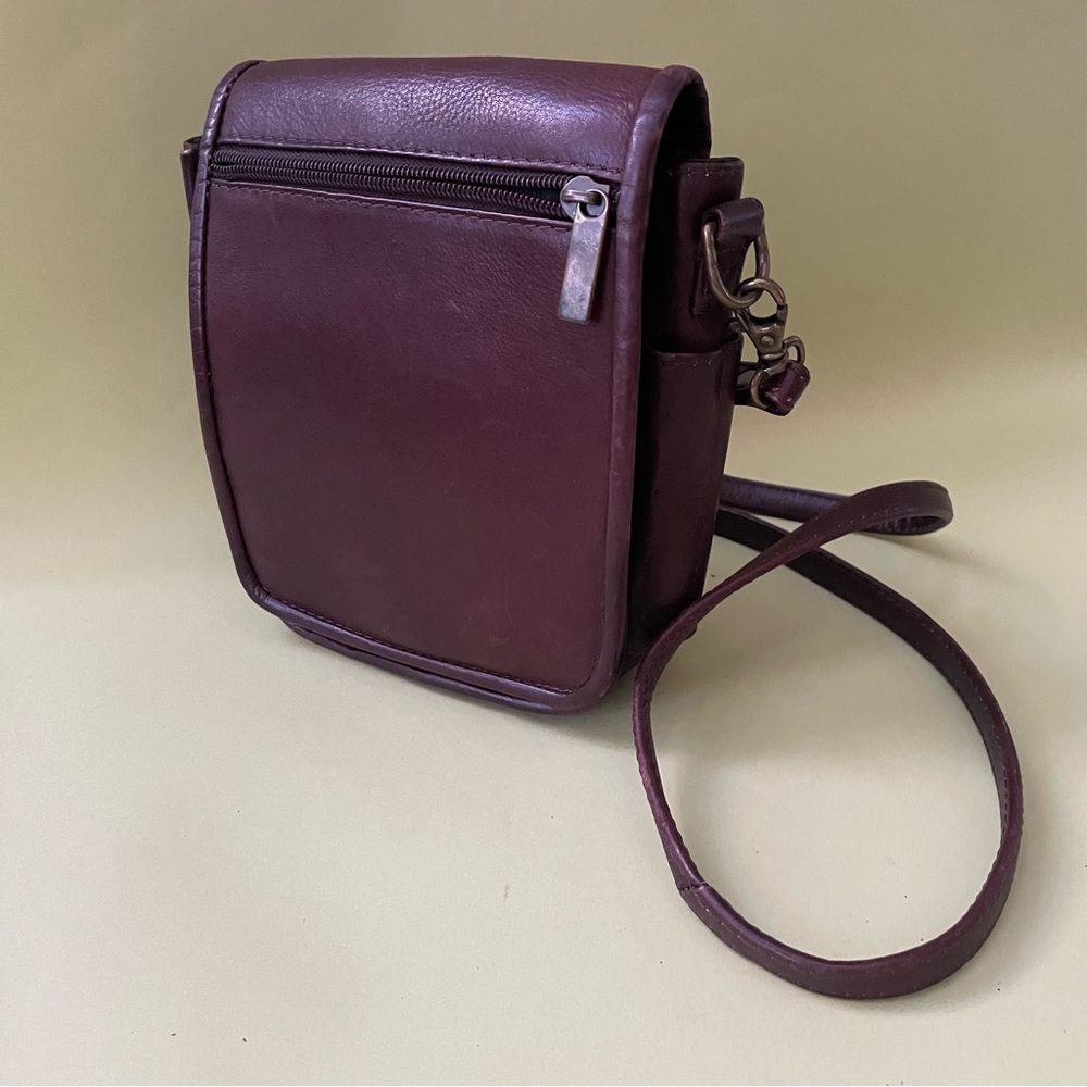 Vintage reddish brown distressed leather crossbody bag